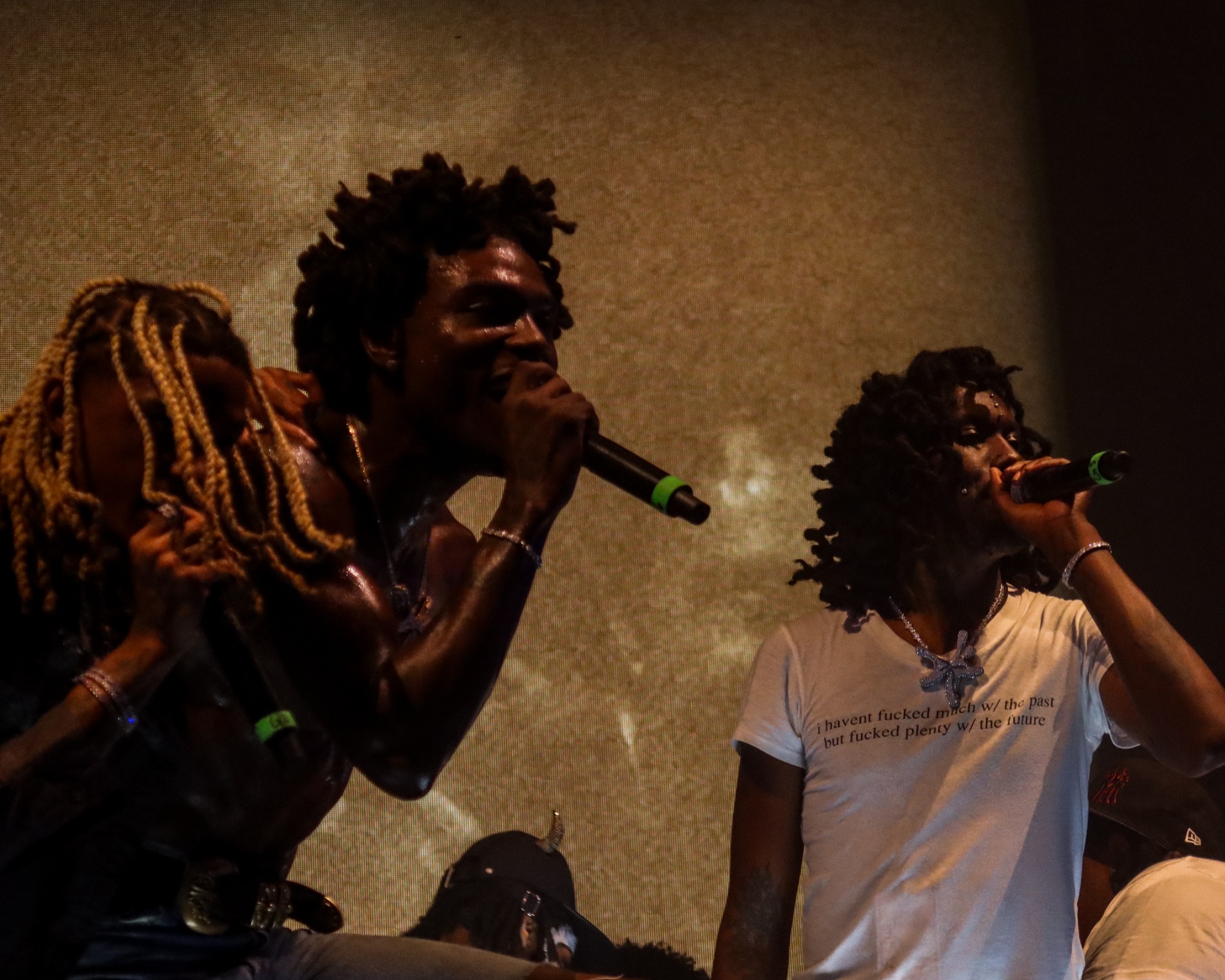Three YSL artists performing together