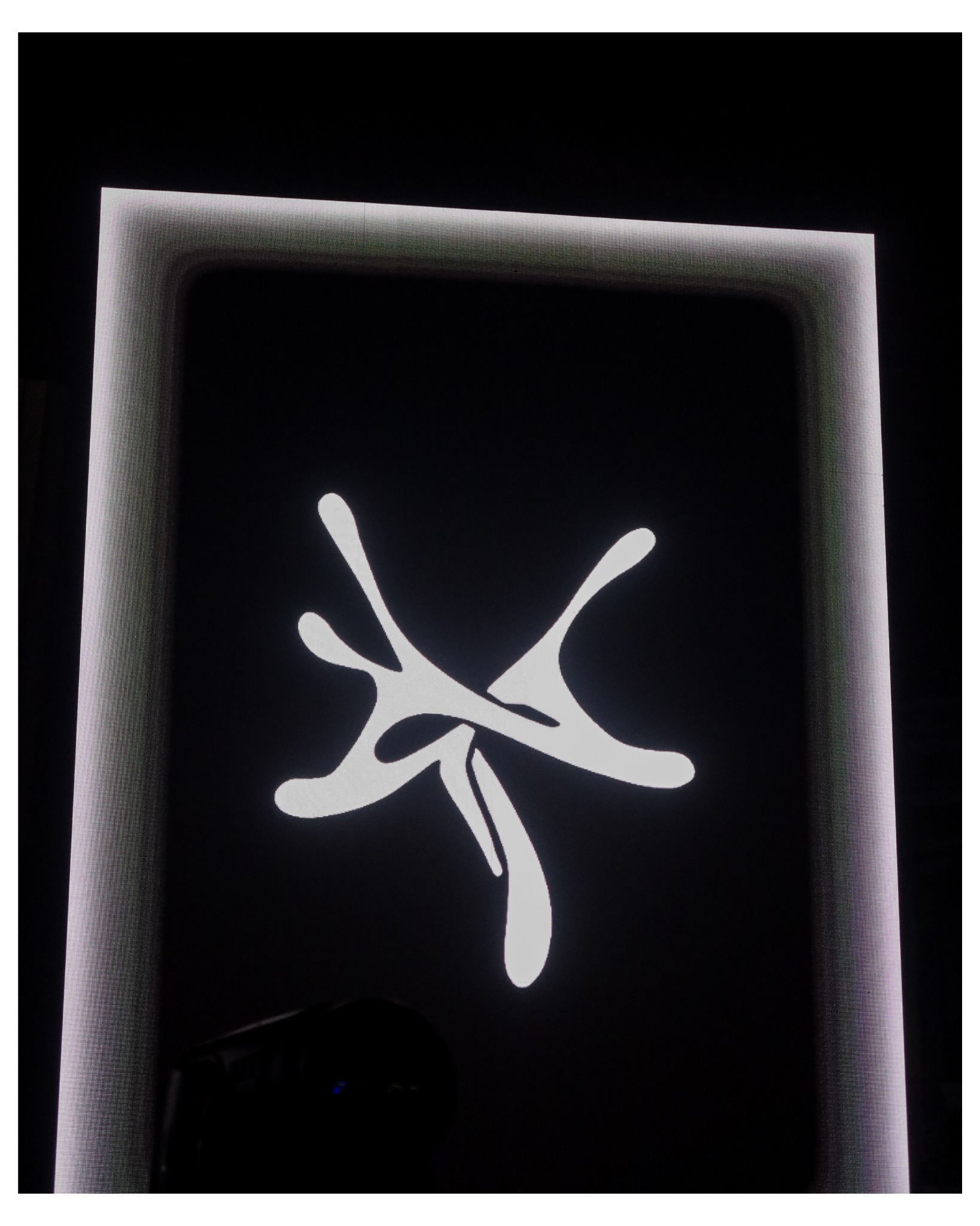 YSL logo displayed above the stage